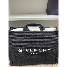 Brand: Givenchy Style: Large Tote Bag Color: Black Material: Woven Raffia Condition: Pre-Owned, Excellent Condition Features: Spacious Interior For All Your Essentials Durable Woven Raffia Construction Iconic Givenchy Paris Logo On The Front Double Top Handles For Easy Carrying Open Top Design For Quick Access Perfect For Daily Use, Beach Days, Or Travel Versatile And Stylish For Any Occasion Details: Upgrade Your Accessory Collection With This Stunning Givenchy Paris Black Woven Raffia Large To Luxury Rectangular Straw Bag For Shopping, Luxury Rectangular Straw Shopping Bag, Luxury Straw Bag With Large Capacity And Double Handle, Luxury Large Capacity Straw Bag With Double Handles, Designer Black Straw Bag For Daily Use, Designer Black Rectangular Straw Bag, Designer Straw Shopping Bag, Designer Straw Bag For Shopping With Top Carry Handle, Luxury Evening Straw Tote Bag