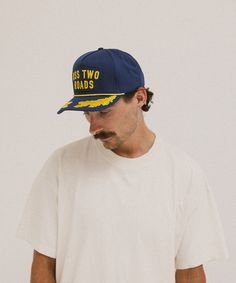 The Norfolk is made from a high quality cotton canvas. It's a tall-crowned, 5-panel trucker style ballcap that might fit you better than any other hat you've ever worn. We've been hearing that from a lot of people. Feather Hat, Dad Caps, Silver Fox, Felt Hat, A Lot Of People, Hat Band, Kids Hats, Ball Cap, Wide Brimmed