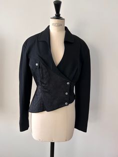 Vintage Thierry Mugler black jacket T.M Fitted with small shoulder pads. Asymmetrical at the bottom. One front pocket. Very rare Thierry Mugler Runway, Mugler Runway, Vintage Thierry Mugler, Mugler Black, Thierry Mugler, Black Jacket, Very Rare, Shoulder Pads, Front Pocket