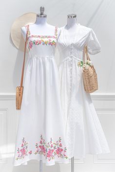 An eye catching summer dress, the Florentina features vibrant floral embroidered on the bodice and hem on a white linen-blend. A smocked elastic back and gentle a-line silhouette make for a comfortable and flattering fit. Perfect for a statement vacation piece, or to simply stun while out and about this summer! Please Note- This item is final sale only. .. Details: S: Bust: 32"-37", Waist 26"-31", Length 50" M: Bust 34"-39", Waist 28"-33", Length 51" L: Bust 36"-41", Waist 30"-35", Length 52" Le Salvadorian Dress, Cute Embroidered Cotton Dress, A Line Frock, Summer Embroidered Princess Dress, White Embroidered A-line Dress For Summer, Summer A-line Sleeveless Dress With Floral Embroidery, White A-line Embroidered Summer Dress, Classical Dress, Long Blouse Designs