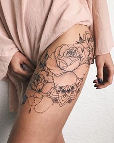 a woman's thigh with roses on it and the words krsten van wellen