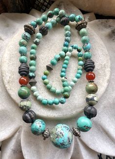 Old Circa 1930s Chinese Natural Blue Green Turquoise Carnelian Tribal Silver Vintage Necklace Necklace measures aprox 30 inches around weighs 79 grams Bohemian Hand-strung Amazonite Necklaces, Blue Chrysoprase Necklace With Natural Stones, Turquoise Agate Gemstone Beads Necklace, Vintage Turquoise Necklace With Round Natural Stones, Vintage Gemstone Beads Jewelry For Meditation, Vintage Turquoise Necklace With Round Beads, Turquoise Chrysoprase Gemstone Bead Necklaces, Agate Turquoise Necklace With Gemstone Beads, Turquoise Agate Gemstone Necklace