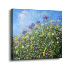 a painting of wildflowers and daisies on a blue sky background canvas wall art print