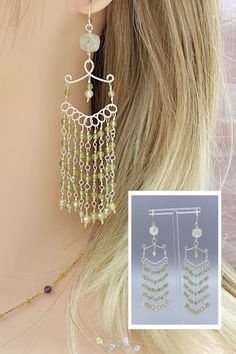 Embrace boho chic with these enchanting wire wrapped peridot drop earrings. The crystal beads add a hint of sparkle, making them the perfect accessory for any occasion. #BohoJewelry #HandcraftedEarrings #WireWrappedEarrings #GemstoneJewelry #UniqueGifts #LongDropEarrings #BohoStyle #CrystalBeads Bohemian Green Wrap Earrings, Adjustable Green Bohemian Wrap Earrings, Handmade Green Chandelier Earrings For Summer, Bohemian Green Wrap Earrings As Gift, Bohemian Green Wrap Earrings Gift, Bohemian Green Wrap Earrings For Gift, Green Dangle Chandelier Earrings For Summer, Bohemian Green Chandelier Earrings For Summer, Summer Green Dangle Chandelier Earrings