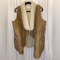 Brand: Velvet By Graham & Spencer Item: Uli Faux Fur Sherpa Lined Vest Size: Medium (Pit To Pit 21”) Color: Tan Condition: New With Tag Remarks: Faux Fur Lining; Suede-Like Polyester Outer; Side Pockets I Only Offer Clean, Undamaged Merchandise As Stated In The Description. Shipments Are Super Quick, Most Generally Mailed Within 24 Hours Of Receipt Of Payment! Thank You For Shopping! You Won't Be Disappointed. And Remember To Have A Bearyniceday Black Fur Vest, Faux Shearling Vest, Spencer Jacket, Faux Suede Vest, Zipper Vest, Shearling Vest, Suede Vest, Cotton Vest, Faux Fur Vests