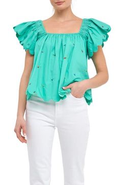 Fluttery short sleeves frame this all-cotton top featuring colorful floral embroidery and elegant scalloped edges. Square neck Short sleeves Lined 100% cotton Hand wash, dry flat Imported