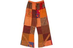 Fun hippie style street-wear cotton patchwork pants with pockets on either side. The color tone of these pants is mainly orange, but also has some brown, red and blue on some patches. These cotton pants are worn as a loose fit and therefore are airy and comfortable; some patches are slightly sheer. The waist has elastic and drawstring for the confident fit. The patches include floral, ethnic, plain and striped prints. Since the product is entirely handmade, there can be slight variation in the g Patchwork Pants, Black Jogger Pants, Boho Jumpsuit, Plaid Crop Top, Hippie Pants, Wide Leg Palazzo Pants, Pants With Pockets, Black Denim Jeans, Rave Wear