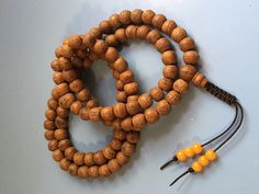 Bodhi seed mala 108 bead Mala Necklace Adjustable Necklace With Large Beads For Rituals, Traditional Adjustable Necklaces With Round Beads, Adjustable Mala With 108 Beads For Rituals, Adjustable Artisan Mala For Rituals, Handmade Brown Necklace For Puja, Traditional Adjustable Necklace With Wooden Beads, Adjustable Hand-strung Holistic Necklace, Hand-strung Adjustable Mala For Festivals, Adjustable Bohemian Necklace For Puja