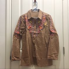 Nwot Floral Embroidered Button Down Shirt. Light Brown. Pit To Pit Flat Measurement: 19 Inches Bohemian Embroidered Button-up Tops, Casual Embroidered Brown Blouse, Casual Brown Embroidered Blouse, Brown Long Sleeve Top With Floral Embroidery, Brown Floral Embroidered Long Sleeve Top, Brown Embroidered Long Sleeve Blouse, Fall Embroidered Collared Blouse, Bohemian Collared Tops With Floral Embroidery, Bohemian Style Embroidered Collared Top