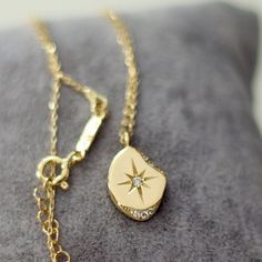 Collection : '' I see lots of stars but none of them is you'' Chain lentgh : 16 in Pendant width : 11mm (0.43 in)  , height : 14mm (0,55 in) Weight for 14K Gold : 3.16gr (approximate) 14K Gold *Fedex Express Shipping 2-7 business days to Worldwide ✦ Registered mail which require a signature ✦ We need your phone number for Fedex/TNT receipts. ✦ We can't send to PO BOX adresses. All of our products are our own designs and are produced in our workshop. These products, which are pure gold, are handcrafted with the purity specified. When you order, you receive beautiful and high-quality jewelery crafted with exquisite craftsmanship and pure gold. Orders are prepared in 2-3 business days and delivered to America, Australia and Europe in 2-5 business days with free shipping. All products reach yo Elegant Gold Necklace With Compass Design, Engraved Star-shaped Yellow Gold Necklace, Gold Necklace With Compass Design For Anniversary, Anniversary Necklace With Star Charm, Engraved Star Yellow Gold Necklace, Gold Anniversary Necklace With Compass Design, Anniversary Gold Necklace With Compass Design, Yellow Gold Star Charm Necklace For Anniversary, 14k Gold Star-shaped Necklace For Anniversary