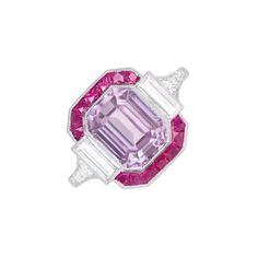 This stunning gemstone ring showcases a 4.18-carat emerald-cut kunzite with a beautiful pink hue. Flanked by two baguette-cut diamonds totaling approximately 0.40 carats, it also features a halo of French-cut rubies weighing about 0.42 carats in total. The tapered shoulders are adorned with approximately 0.16 carats of round brilliant-cut diamonds. Handcrafted in platinum, the ring boasts fine milgrain detailing and decorative openwork on the under-gallery. Ring Size: 6.5 US, Resizable Metal: Platinum Stone: Diamond, Kunzite, Ruby Stone Cut: Emerald Cut Style: Art Deco Total Weight: 6.79 Grams Kunzite Engagement Ring, Emerald-cut Ruby Ring Fine Jewelry, Pink Emerald-cut Jewelry With Halo Setting, Pink Emerald-cut Diamond Ring In Fine Jewelry, Luxury Emerald-cut Lab-created Ruby Jewelry, Engagement Ring Ruby, Luxury Emerald-cut Ruby Ring In Sterling Silver, Mens Diamond Jewelry, Ring Ruby