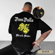 ⬇️ 》PLEASE READ TERMS BEFORE PURCHASE《 ⬇️ Roll the dice with this exclusive Dom Dolla "Miracle Maker" shirt! Features bold graphics with yellow dice and Dom Dolla's name in striking white text. Perfect for house music lovers and EDM enthusiasts. Rock this tee at your next festival, club night, or just to show off your love for electronic dance music. Small logo on the front, big impact on the back - be the Miracle Maker on the dance floor! - - RETURNS - - (please read) 🔻 All sales are final! Si Outfit Techno, Edm Dj, Elsa Shirt, Music Tees, Club Night, Electronic Dance Music, Shirt Store, Bold Graphics, House Music