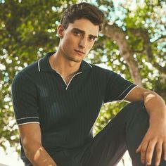 Crafted in a durable blend of cotton and polyester, this rib-stitch short-sleeved polo sweater showcases a solid flat knit Johnny collar, armbands, and waist. Soft against the skin with comfort stretch and added strength for lasting wear, it strikes the perfect balance between comfort and durability. Ribbed Polo Shirt Outfit Men, Navy Short Sleeve Polo Shirt With Ribbed Collar, Navy Short Sleeve Polo Sweater With Ribbed Collar, Navy Short Sleeve Tops With Ribbed Collar, Navy Short Sleeve Top With Ribbed Collar, Fitted Navy Polo Sweater With Ribbed Collar, Casual Fitted Polo Shirt With Ribbed Cuffs, Casual Short Sleeve Polo Shirt With Ribbed Cuffs, Fitted Ribbed Short Sleeve Polo Shirt