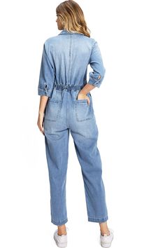 Aviator-inspired coverall with a collared neckline, button down closure down the front. Complete with chest pockets, as well on the front and back. 3/4 length sleeves with a button closure on the ends. Relaxed silhouette with an elastic waistband and straight-leg ankle length bottoms. Runs big! CARE | Machine Wash Cold CONTENTS | 65% Cotton, 33.7% Polyester, 1.3% Spandex MEASUREMENTS | 56"/142 cm Top to Bottom 26"/65 cm Inseam (Size Small) MODEL | 5'8 - wearing a size Small IMPORTED Trendy Cotton Collared Jumpsuits And Rompers, Trendy Collared Cotton Jumpsuits And Rompers, Casual Fall Jumpsuits And Rompers With Patch Pockets, Button-up Denim Jumpsuit With Pockets In Medium Wash, Medium Wash Denim Jumpsuit With Pockets, Medium Wash Button-up Denim Jumpsuit With Pockets, Utility Overalls With Button Closure And Relaxed Fit, Casual Collared Denim Jumpsuit, Casual Collared Denim Jumpsuit With Pockets