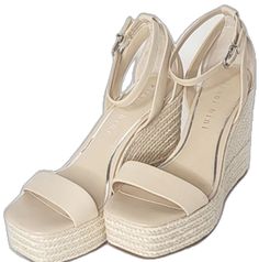 Spring Formal Beige Wedge Sandals, Beige Synthetic Wedge Sandals With Heel Strap, Cream Wedge Sandals With Heel Loop, Beige Formal Wedge Sandals For Summer, Cream Wedge Sandals With Heel Strap For Spring, Cream Wedge Sandals For Spring Formal, Cream Wedge Sandals For Formal Spring Events, Formal Beige Ankle Strap Wedge Sandals, Cream Wedge Sandals With Wrapped Heel