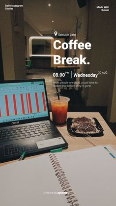 an open laptop computer sitting on top of a desk next to a cup of coffee