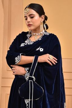 Midnight blue lehenga in velvet base. Paired with V neck padded blouse and gota lace embellished scallop bordered dupatta. Comes with a potli bag. - Aza Fashions Velvet Lehenga With Dabka Work For Wedding, Wedding Velvet Sets With Dabka Work, Wedding Velvet Set With Dupatta, Velvet Wedding Sets With Dupatta, Anarkali Velvet Sharara For Reception, Velvet Anarkali Set For Reception, Anarkali Style Velvet Sharara For Reception, Velvet Wedding Set With Dupatta, Velvet Salwar Kameez For Wedding