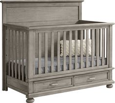 a baby crib with two drawers and a bed in the middle, on a white background