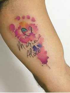 a watercolor tattoo with the words mama alice written on it's left arm