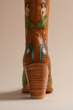 These Eve Doodle Cowboy Boots are each handmade and hand painted with love by artisans in México. Each pair features Eve in the Garden of Eden. As they are made in México, the fit is slightly wider and they run half a size large, so we recommend that half sizes size down. Our Doodle Boots are handmade and hand painted boots made by Artisans in México using traditional techniques, these cowboy boots are a literal dream come true for us. This is a very small batch production. 4 inch heel. SIZING D Cowboy Boots Advertisments, Unique Cowboy Boots, Tooled Boots, Mermaid Doodle, Hand Painted Boots, Virtual Window, Cowgirl Things, Painted Boots, Brother Vellies