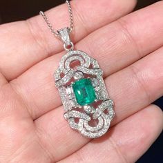 "ENJOY OUR WORRY-FREE SERVICE AND THE DAZZLING, GENUINE JEWELRY WE DESIGN AND HANDCRAFT WITH LOVE❤️ ABOUT THE ITEM: ONE OF A KIND HANDCRAFTED PENDANT! BRAND NEW! \"You will get the best emeralds from the most experienced emeralds wholesaler in the world--So Perfect Jewelry.\"  CERTIFIED, JUMBO, VIVID GREEN EMERALD!! STUNNING, 4.23 total carats, Certified Emerald, ART DECO pendant. UNIQUE DESIGN! ONE OF A KIND! Mesmerizing Zambian emeralds, at 2.55 carats, this emerald is just the right size, wit Luxury Silver Necklace Gia Certified, Luxury Gia Certified Diamond Necklace Gift, Luxury Gia Certified Diamond Necklace As Gift, Luxury Platinum Necklace Gia Certified, Exquisite Gia Certified Diamond Necklace, Luxury Gia Certified Platinum Necklace, Exquisite Gia Certified Jewelry Gift, Gia Certified Silver Platinum Necklace, Gia Certified Platinum Jewelry Gift