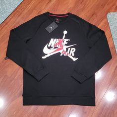 Nwt Men's Size L Jordan Sweatshirt. Style Is Standard Fit. Black Sports T-shirt, Black Crew Neck Sportswear Sweater, Black Crew Neck Sweater Sportswear, Black Crew Neck Sweater For Sportswear, Black Crew Neck Sweater In Sportswear Style, Black Crew Neck Sweater For Sports, Black Casual Sweatshirt For Sports Season, Casual Black Sweatshirt For Sports Season, Black Fleece Crew Neck Top