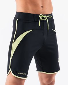 HIGHLIGHTS.. Unlined boardshort. 9” inseam Reflective branding at leg opening and back waistband Elastic waistband with adjustable self-tie drawcords Color-blocking panelling Water resistant fabric FIT SUGGESTION. This item runs true to Alphalete’s standard sizing.. Fit is based off of waist size in inches.. If you are between sizes, we recommend sizing up for a relaxed fit.. Eric is 6’2”/188cm, wearing a size 32. MATERIALS AND WASHING DIRECTIONS. 67% Nylon, 23% spandex. Due to the high saturati Black Bottoms With Built-in Shorts For Water Sports, Athleisure Athletic Shorts With Built-in Shorts For Water Sports, Athleisure Athletic Shorts For Water Sports With Built-in Shorts, Black Shorts With Built-in Shorts For Water Sports, Water Sports Bottoms With Built-in Shorts In Black, Black Shorts With Built-in Liner For Water Sports, Sports Bottoms With Built-in Shorts And Tie-sides, Green Sporty Swim Trunks With Drawstring, Functional Black Bottoms For Water Sports