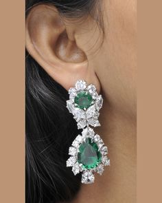 All of the products are MADE TO ORDER in India. They are handcrafted by me and my expert artisan team. *Gemstone Grade: AAAAA (Natural Diamond Coated) *Base Metal: 925 Sterling Silver *Plating: Rhodium Plated *Gemstone: Emerald           SKU : AAER_DE_270 *PLEASE NOTE* *   This product is completely eco-friendly and non-aggressive to all skin type.  *   It does NOT contain nickel, cadmium, or lead. Find more amazing products like Rings, Earrings, Necklace, Brooches, Bracelets, Tiara at our shop: Sterling Silver Hand Set Drop Jewelry, Hand Set Sterling Silver Drop Jewelry, Fusion Style Sterling Silver Bridal Earrings For Formal Occasions, Fusion Style Teardrop Jewelry For Formal Occasions, Formal Fusion Teardrop Jewelry, Sterling Silver Fusion Bridal Earrings For Gift, Luxury Green Diamond Earrings For Wedding, Hand Set Sterling Silver Teardrop Bridal Earrings, Hand Set Sterling Silver Teardrop Earrings