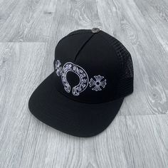 - Embroidery logo to front - Mesh rear with adjustable snapback fastening - Flat peak - Rigid cotton material - Inner branding