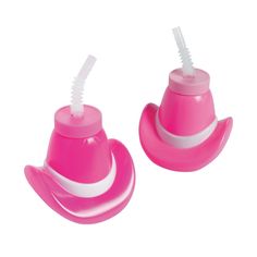 two pink hats with straws sticking out of them on a white background, one is shaped like a cowboy's hat