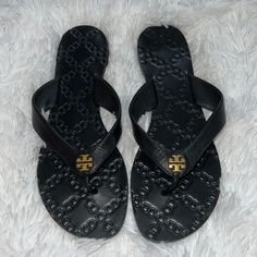 Never Worn Luxury Black Leather Flip Flops, Designer Black Leather Flip Flops, Designer Black Flip Flops For The Beach, Designer Black Flip Flops For Beach, Chic Black Leather Flip Flops, Designer Black Synthetic Sandals, Tory Burch Jelly Sandals, Tory Burch Black Sandals, Tory Burch Espadrilles