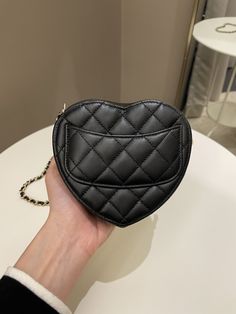 Chanel 22S Heart BagBlack Stiff Lambskin LGHWSmall 12 x 11.5 x 4 cmStrap drop 56 cm31 series9.9/10 New Kept Unused (inevitable scratch on hardware knob otherwise new)Includes box, dust bag and ity cardPrice now 4999 sgd 3850 usd CN5164-01 Luxury Portable Black Bag, Black Compact Luxury Bag, Luxury Black Compact Bag, Luxury Compact Black Bag, Luxury Portable Black Shoulder Bag, Luxury Leather Heart-shaped Shoulder Bag, Black Leather Heart-shaped Bag, Luxury Heart-shaped Bags With Detachable Strap, Compact Black Bag