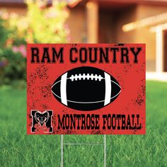 a yard sign with a football on it