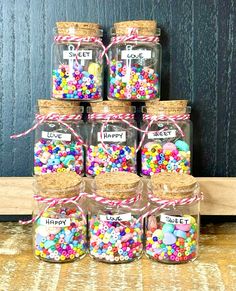 there are many jars that have candy in them