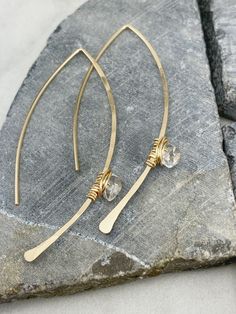 These hand-forged lightweight threader earrings go perfectly with any outfit. These 14 k gold fill drops measure in at a little over two inches. With a herkimer diamond 14 k gold fill wrap they are simple and elegant. Boho chic! Available in any combination of sterling silver, gold fill or rose gold fill. Please convo me for a different metal combination. Your Rachel Dawn Designs piece will come in a recycled box topped with a bow for you or a friend! PLEASE NOTE this is handmade jewelry. There Delicate Wire Wrapped Earrings For Everyday, Everyday 14k Gold Filled Nickel Free Threader Earrings, Delicate Gold Wrap Earrings, Gold Teardrop Threader Earrings 14k Gold Filled, Handmade Gold Long Drop Threader Earrings, Brass Threader Earrings For Everyday, 14k Gold-filled Wrap Earrings With Ear Wire, Gold Wrap Earrings With 14k Gold Filled Ear Wire, 14k Gold Filled Wrap Earrings With Ear Wire