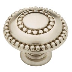 an antique style knob with beading on the top and bottom, in stainless steel