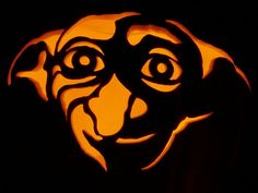 a pumpkin carved to look like a dog