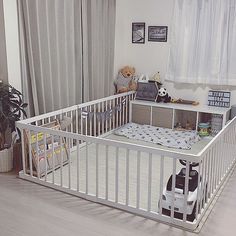 there is a baby crib in the room