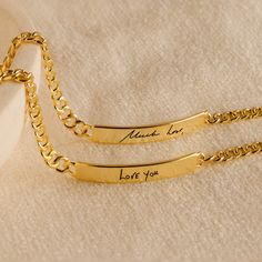 Let your handwriting tell a story that lasts a lifetime with our Men's Engraved Bracelet, a customized masterpiece that transforms cherished words into a wearable, stylish accessory. Crafted with precision and care, this engraved bracelet immortalizes meaningful messages, creating a truly unique and sentimental gift. Whether it's a heartfelt note, a special date, or a memory etched in time, this personalized bracelet serves as an enduring memorial gift he'll cherish 🤍 Material: High Quality Sol Classic Personalized Bracelets For Promise, Elegant Engraved Bracelets For Father's Day, Engraved Nameplate Bracelet For Friendship, Customized Bracelets For Anniversary And Father's Day, Meaningful Engraved Promise Bracelets, Meaningful Engraved Bracelets For Promise, Personalized Rose Gold Bracelets For Promise, Personalized Rose Gold Bracelet For Promise, Minimalist Engraved Bracelet For Promise