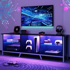 an entertainment center in a living room with purple and blue lights on the wall, video game console next to it