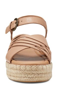 Slender straps cross over a wide counterpart on this cushioned sandal set atop a jute-wrapped platform. 1 3/4" heel; 1 1/4" platform Adjustable ankle strap with buckle closure Cushioned footbed Leather upper/synthetic lining and sole Imported Beach Sandals With Adjustable Cross Strap, Beach Sandals With Cross Straps, Spring Beach Slingback Sandals With Cross Strap, Spring Cross Strap Slingback Sandals For Beach, Spring Beach Cross Strap Slingback Sandals, Spring Adjustable Cross Strap Slingback Sandals, Beach Slingback Sandals With Cross Strap And Buckle, Beach Slingback Sandals With Buckle And Cross Strap, Spring Cross Strap Footbed Sandals With Adjustable Strap