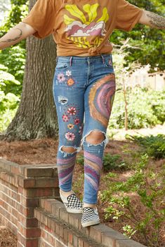 The coolest Unique, Hippie flower child jeans ever! Perfect for summer and fall music festivals...Colorful jeans that will complement any cute crop top or vintage tee for the summer season! Bohemian Summer Cotton Jeans, Bohemian Cotton Jeans For Summer, Bohemian Style Cotton Summer Jeans, Summer Bohemian Festival Jeans, Bohemian Jeans For Summer Festivals, Bohemian Summer Festival Jeans, Spring Bohemian Jeans, Trendy Summer Jeans With Floral Print, Trendy Spring Jeans With Graphic Print