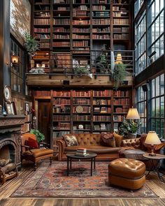 an old library with lots of bookshelves and leather couches in the middle