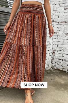 Elevate your casual style with this tribal floral print high waist skirt. Its A-line silhouette and maxi length create a graceful and flowy look. The intricate floral print adds a touch of bohemian charm, making it a versatile choice for various occasions. Summer Bohemian Skirt, Casual Boho Print Maxi Bottoms, Bohemian High Waist Maxi Skirt With Elastic, Bohemian High Waist Lined Maxi Skirt, Bohemian High Waist Maxi Skirt With Elastic Waistband, Non-stretch Maxi Skirt For Vacation, High Waist Flowy Bohemian Skirt, Bohemian High Waist Non-stretch Maxi Skirt, Casual Boho Print Skirt