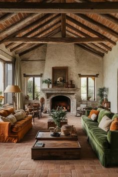 a living room filled with furniture and a fire place in the middle of a room