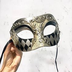 "The most trusted Etsy store, 4everstore, brings you another gorgeous mask creation to wear and add to your collection of Venetian Masquerade Masks! You're guaranteed to look spectacular at any events you attend when wearing this stunning mask! Materials/Techniques: It's made of Resin with Venetian paint design. Measures: Approximately 6.25\"wide x 3.25\"tall - One size fits almost all facial features. ----------------------------------------------------------------------------------- Please con Masquerade Mask Silver, Silver Mask, Masquerade Masks, Mask Black