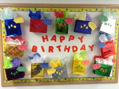 a happy birthday sign made out of colorful gift bags