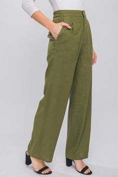 Expertly crafted from high quality linen, these Olive Linen Front Creased Pants are a must-have for any fashion forward individual. The front creases create a sophisticated and polished look, while the breathable linen material ensures comfort and style. Elevate your wardrobe with these versatile and timeless pants. Fabric & fit:55% LINEN, 45% VISCOSE Model is wearing size small. Solid Linen Pants With Welt Pockets, Green Linen Wide Leg Pants For Work, Chic Solid Color Linen Wide Leg Pants, Chic Solid Linen Wide Leg Pants, Fall Wide Leg Linen Pants With Elastic Waistband, Solid Linen Pants For Workwear, Business Casual Linen Bottoms, Business Casual Linen Trousers, Spring Linen Wide-leg Bottoms