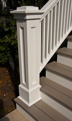 an image of a white railing on the stairs