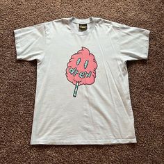 Drew House By Justin Bieber Cotton Candy Ss Tee (Light Blue With Pink Decal) Size Medium. From The First/Second Drew House Drop Ever, So Super Rare! Worn Twice, In Excellent Condition. Slight Yellow Discoloration From The Yellow Dye In The Tag Spreading Along Collar When I Hand Washed It. Not At All Noticeable & Did Not Go Through The Fabric To The Outside. Pink Cotton Short Sleeve Shirt, Light Blue Short Sleeve Shirt With Graphic Print, Pink Short Sleeve Graphic Tee, Light Blue Short Sleeve Shirt For Streetwear, Justin Bieber Shirts, Justin Bieber Tour, Casual Logo, Drew House, White Tee Shirts